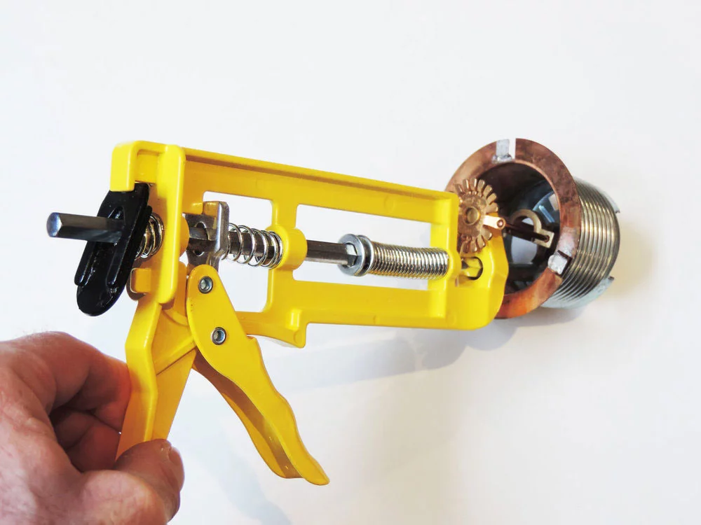 Shutgun for concealed water sprinkler heads attached to a mounted sprinkler