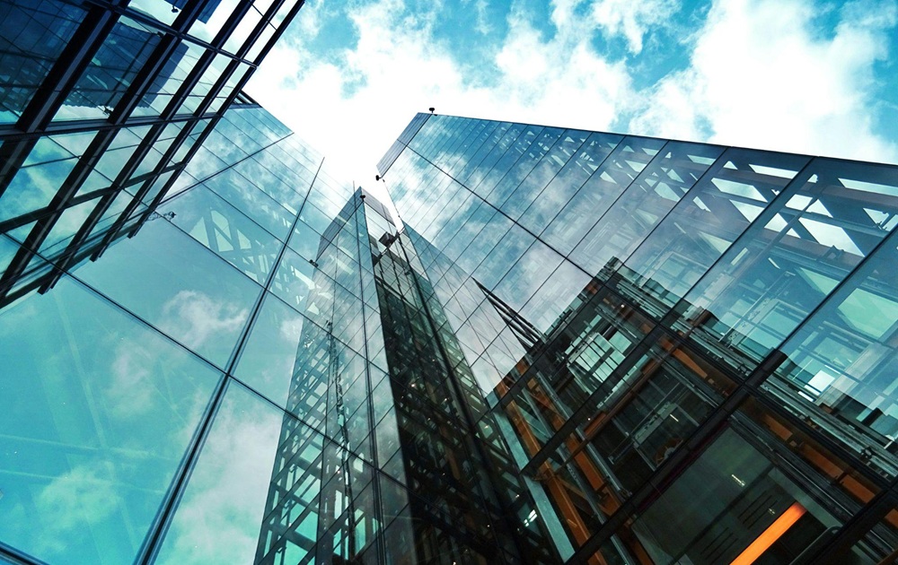 Looking upward at a modern high-rise building